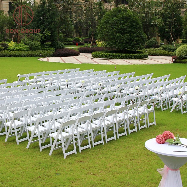 foshan factory cheap price foldable wedding supplies chairs plastic furniture white resin outdoor folding wedding chairs