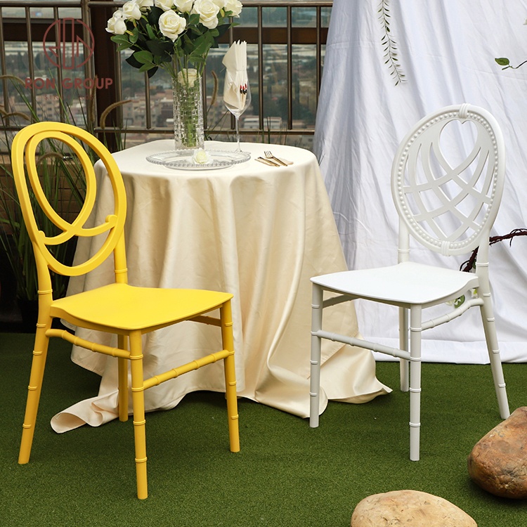 Modern stackable white yellow PP plastic dining crown restaurant hotel party phoenix tiffany wholesale wedding and event chairs