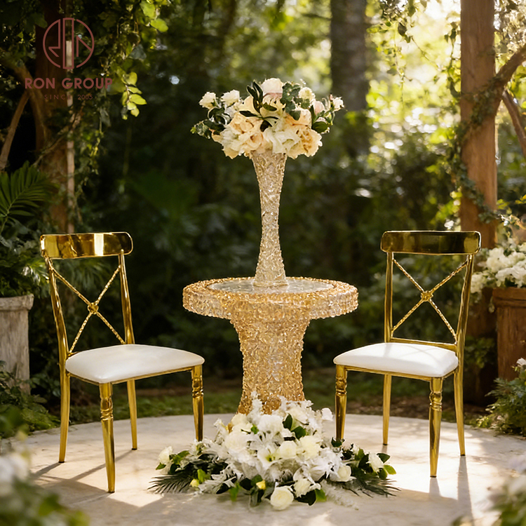 Modern Gold X-Back Banquet Chair with Decorative Center Ornament and Tapered Legs