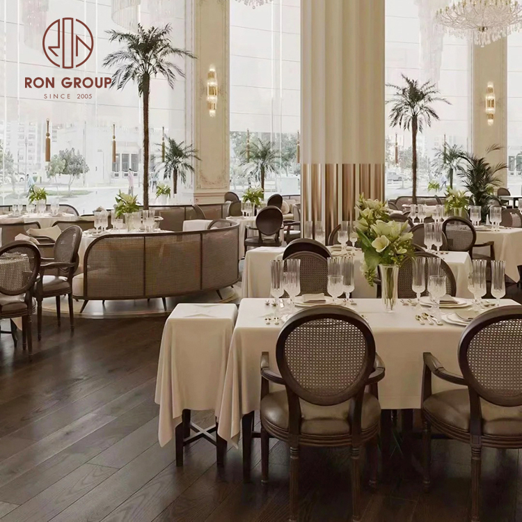 Walnut Cane-Back Armchairs & Round Banquet Tables Set for Hotel Wedding Receptions